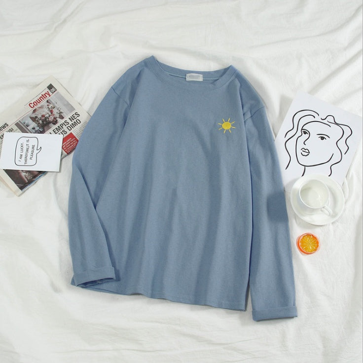 A super - sleeved black cec top for autumn