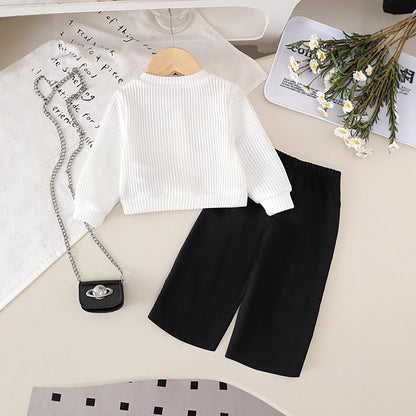 Wool Flower White Long Sleeves Top Black Trousers
