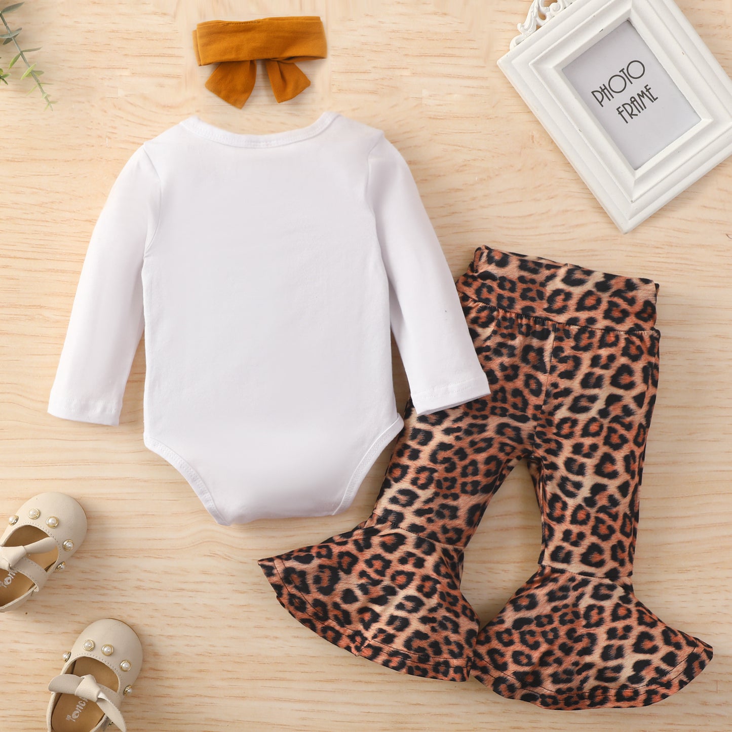 Printed Romper And Leopard-print Flared Trousers