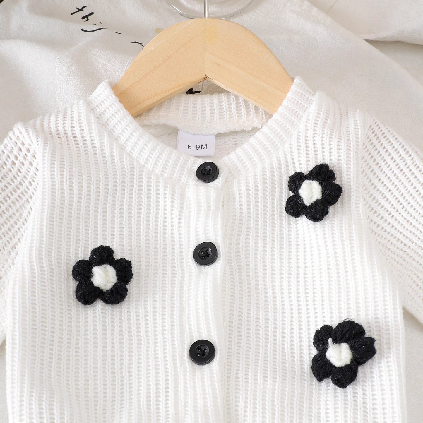 Wool Flower White Long Sleeves Top Black Trousers