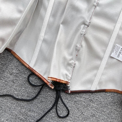 A Backless Top With A Chest And A High-waisted Crop Top